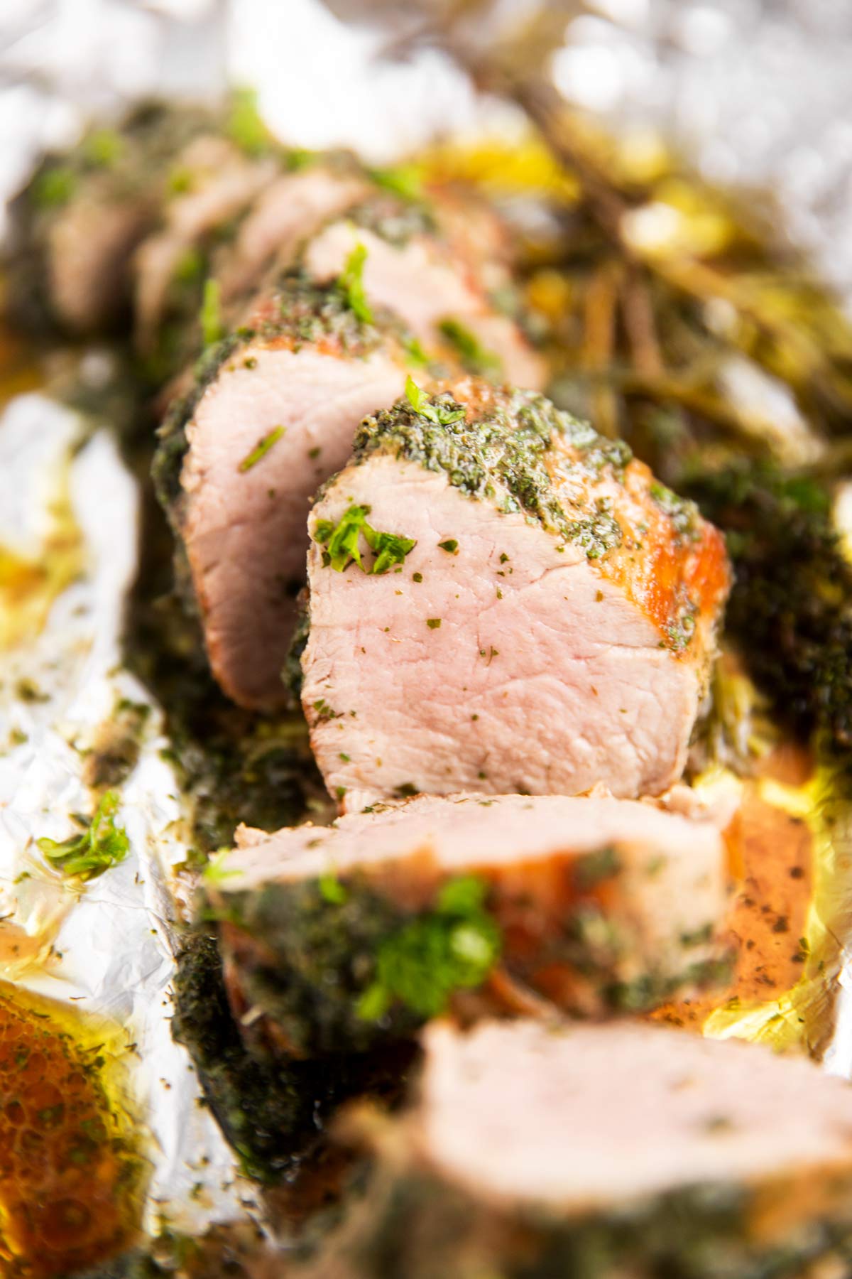 sliced pork tenderloin with herbs