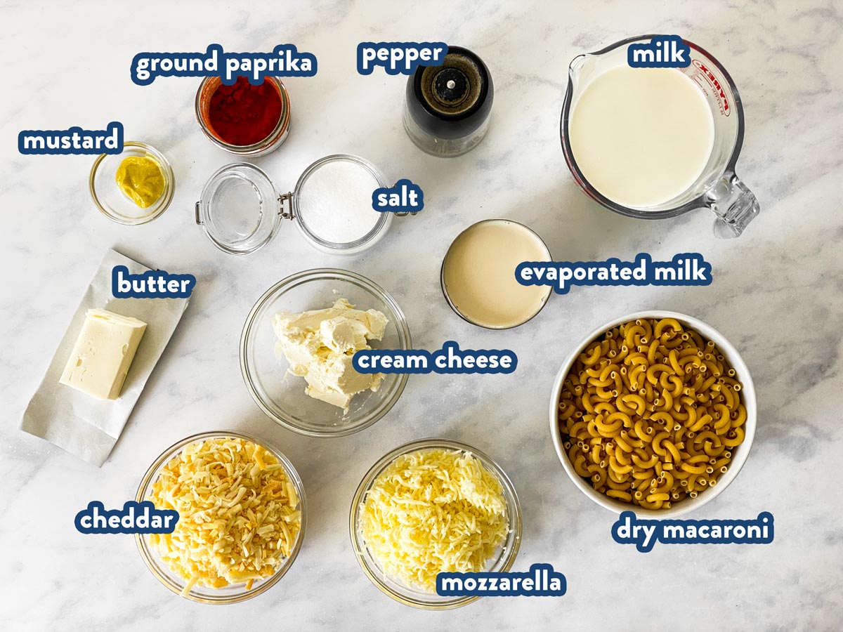 photo of ingredients to make crockpot Mac and cheese with text labels