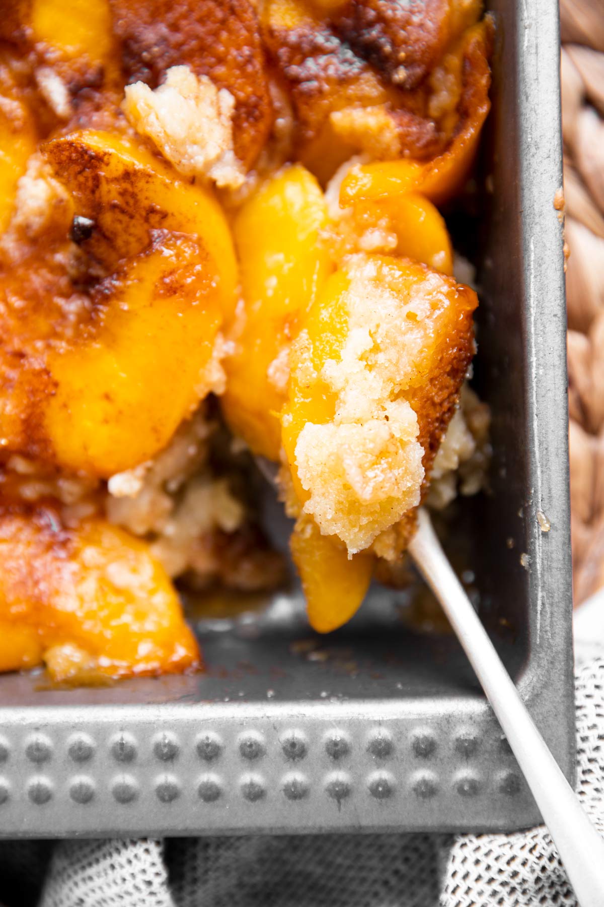 close up photo of peach cobbler