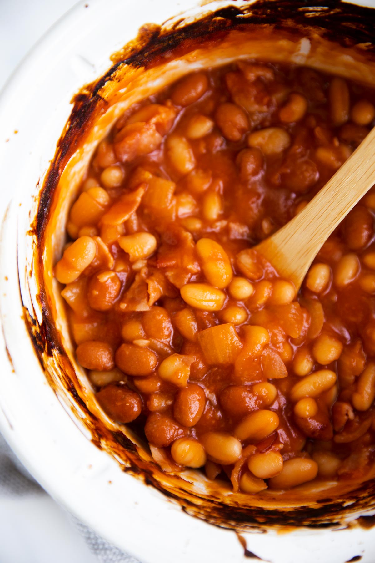 overhead view of baked beans in crockpot