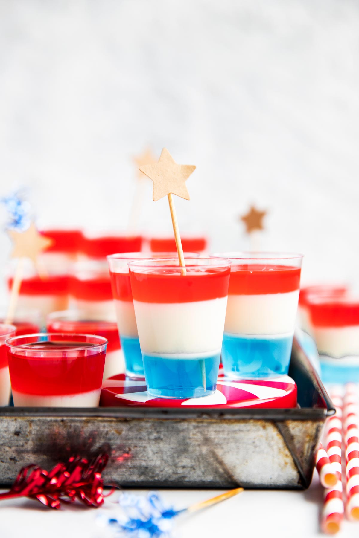 several layered jello shots in metal pan