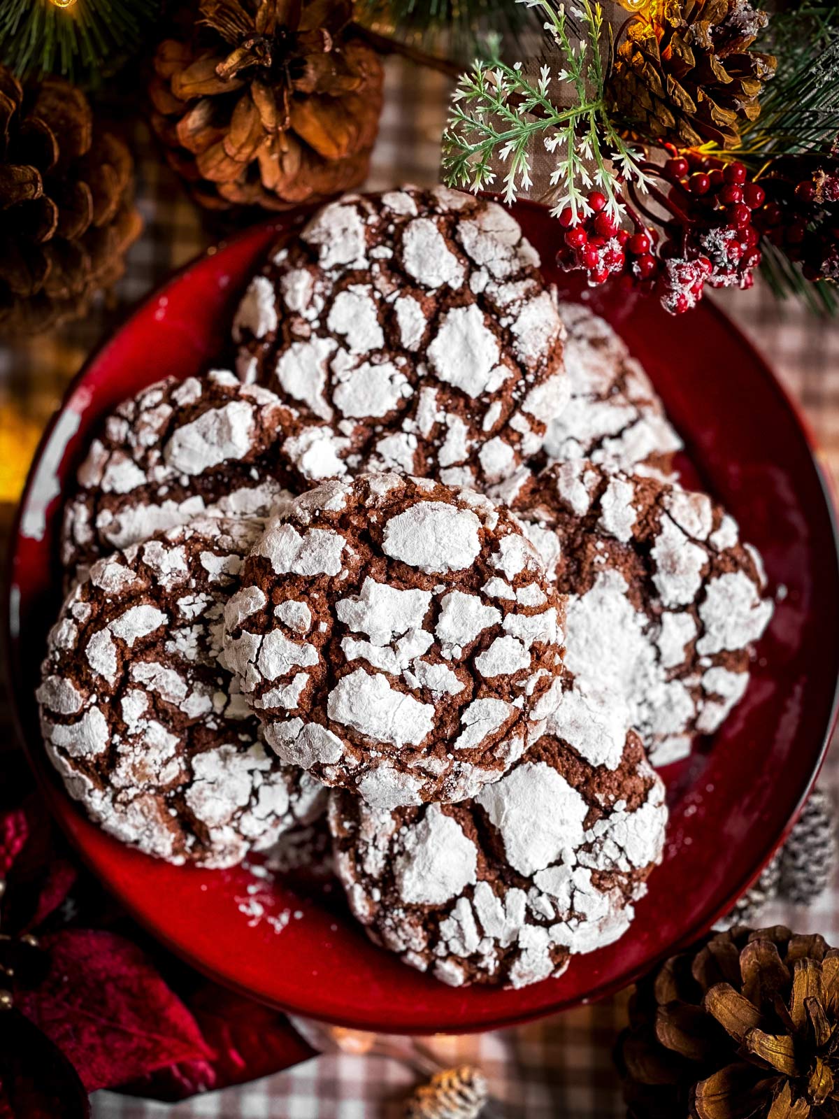 red plate with chocolate crinkle cookies