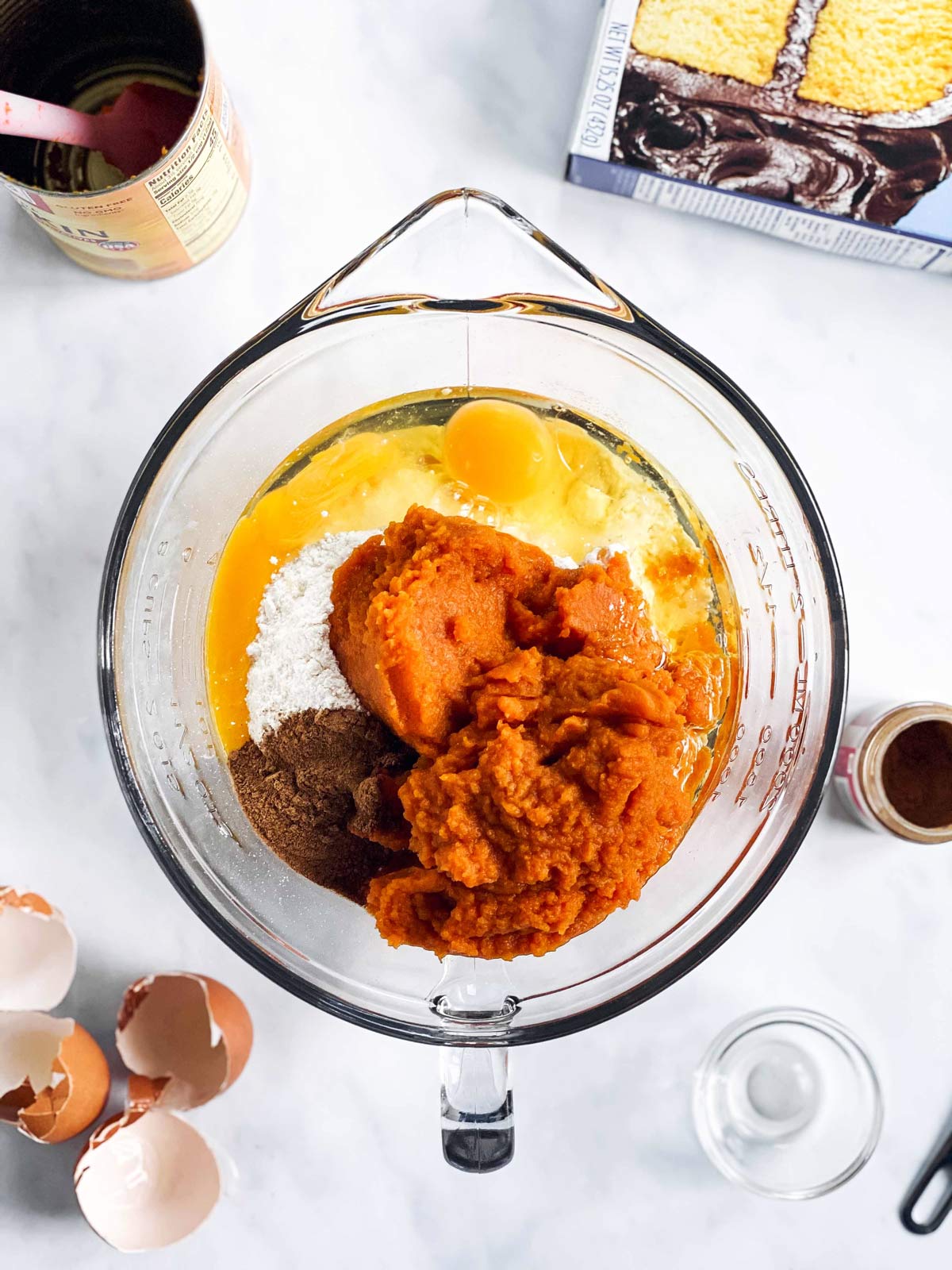 bowl with ingredients for pumpkin bread