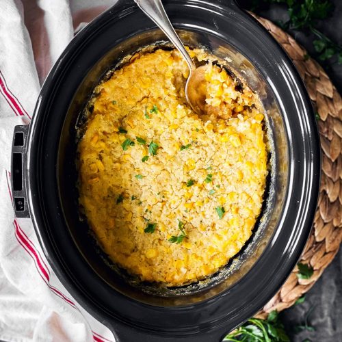overhead view of slow cooker with corn casserole