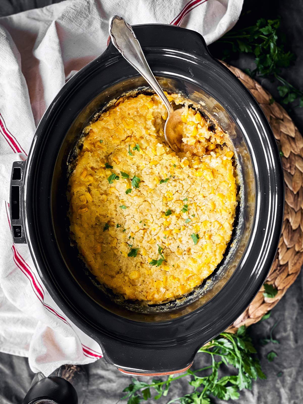 overhead view of slow cooker with corn casserole