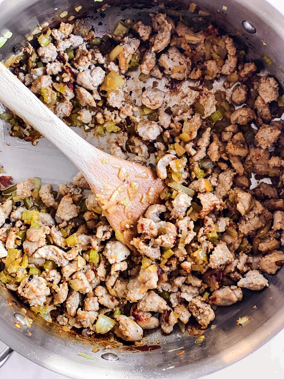 browned sausage and celery in skillet