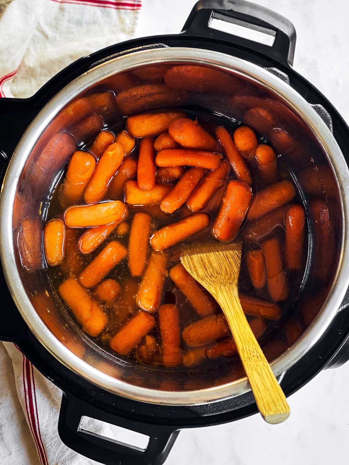 overhead view of instant pot with glazed carrots