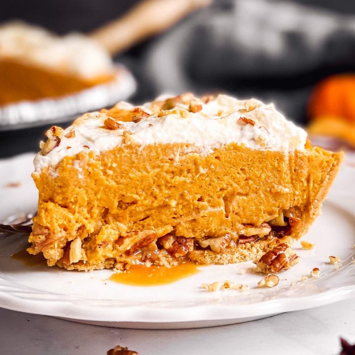 slice of turtle pumpkin pie on a white plate