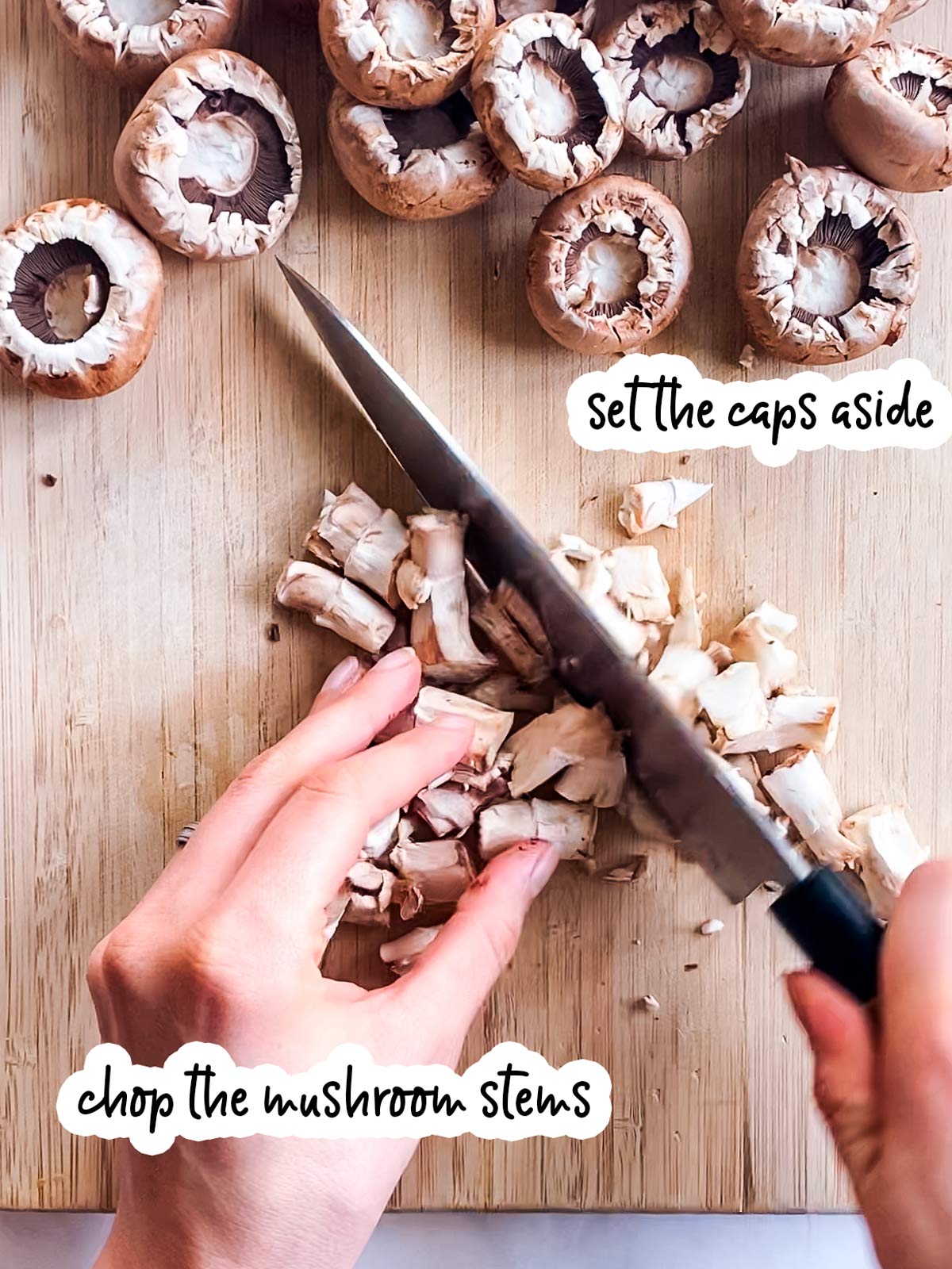 female hands chopping mushroom stems