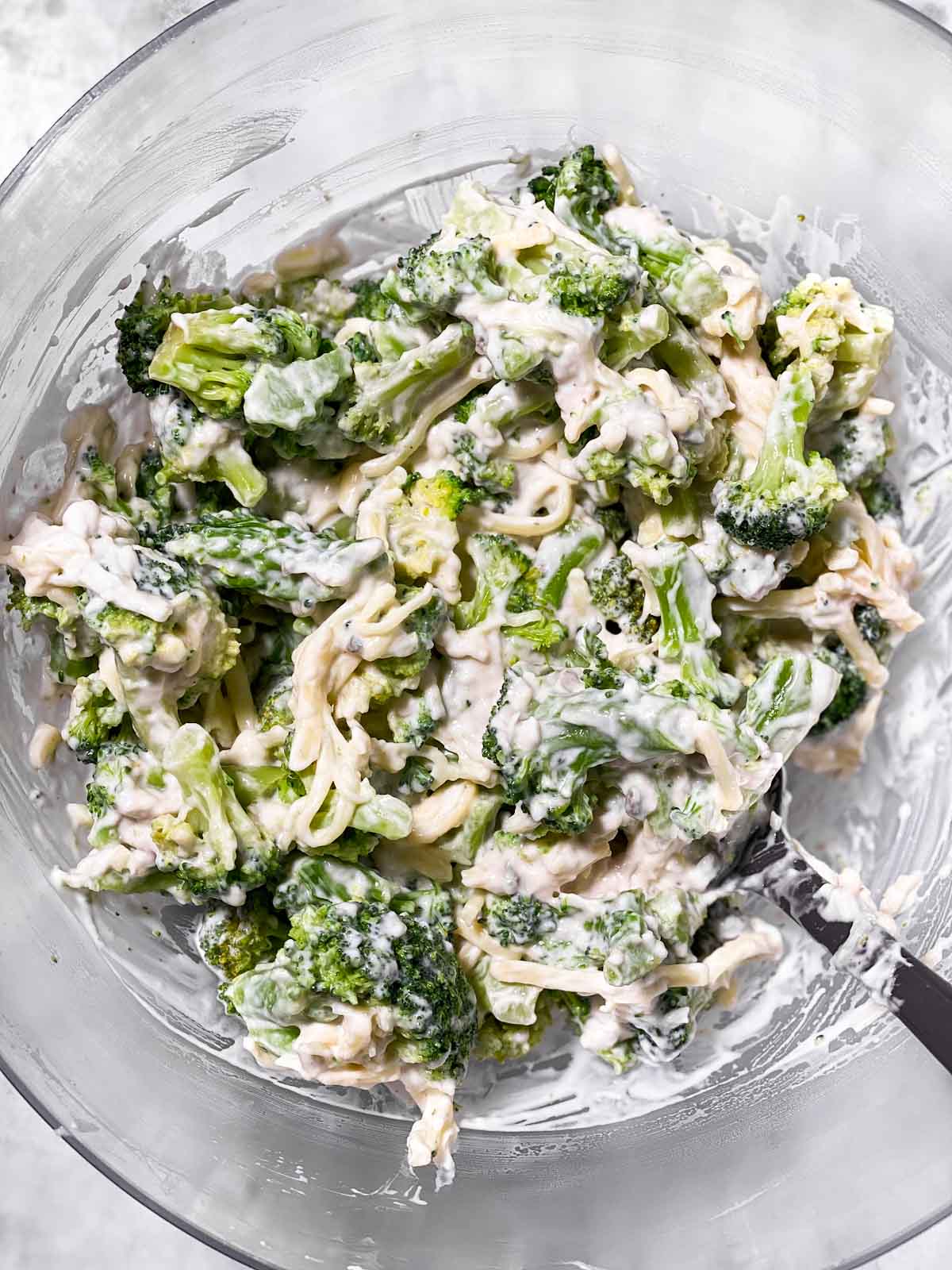 broccoli casserole filling prepared in glass bowl