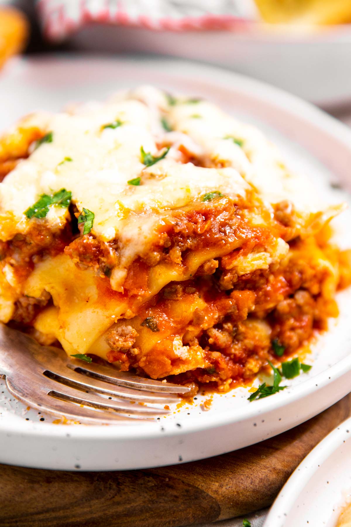 slice of crockpot lasagna on white plate