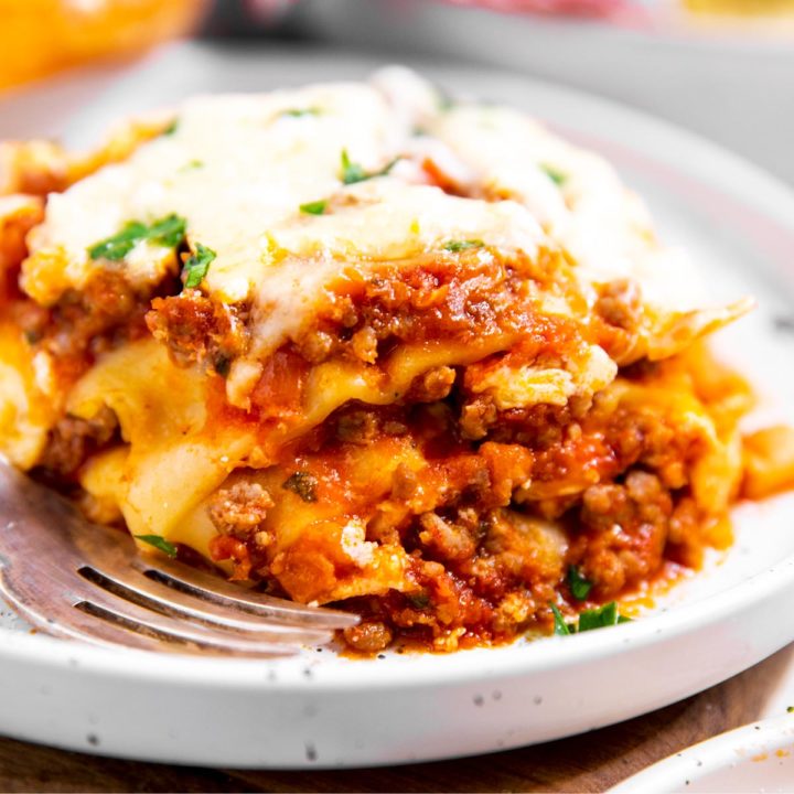 slice of crockpot lasagna on white plate