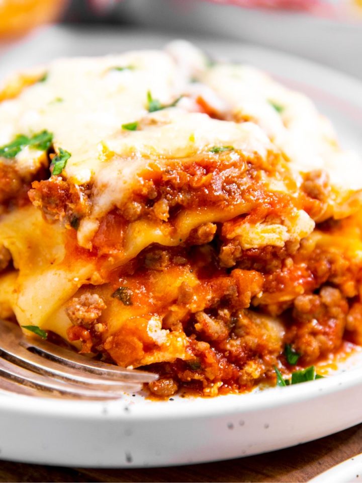 slice of crockpot lasagna on white plate