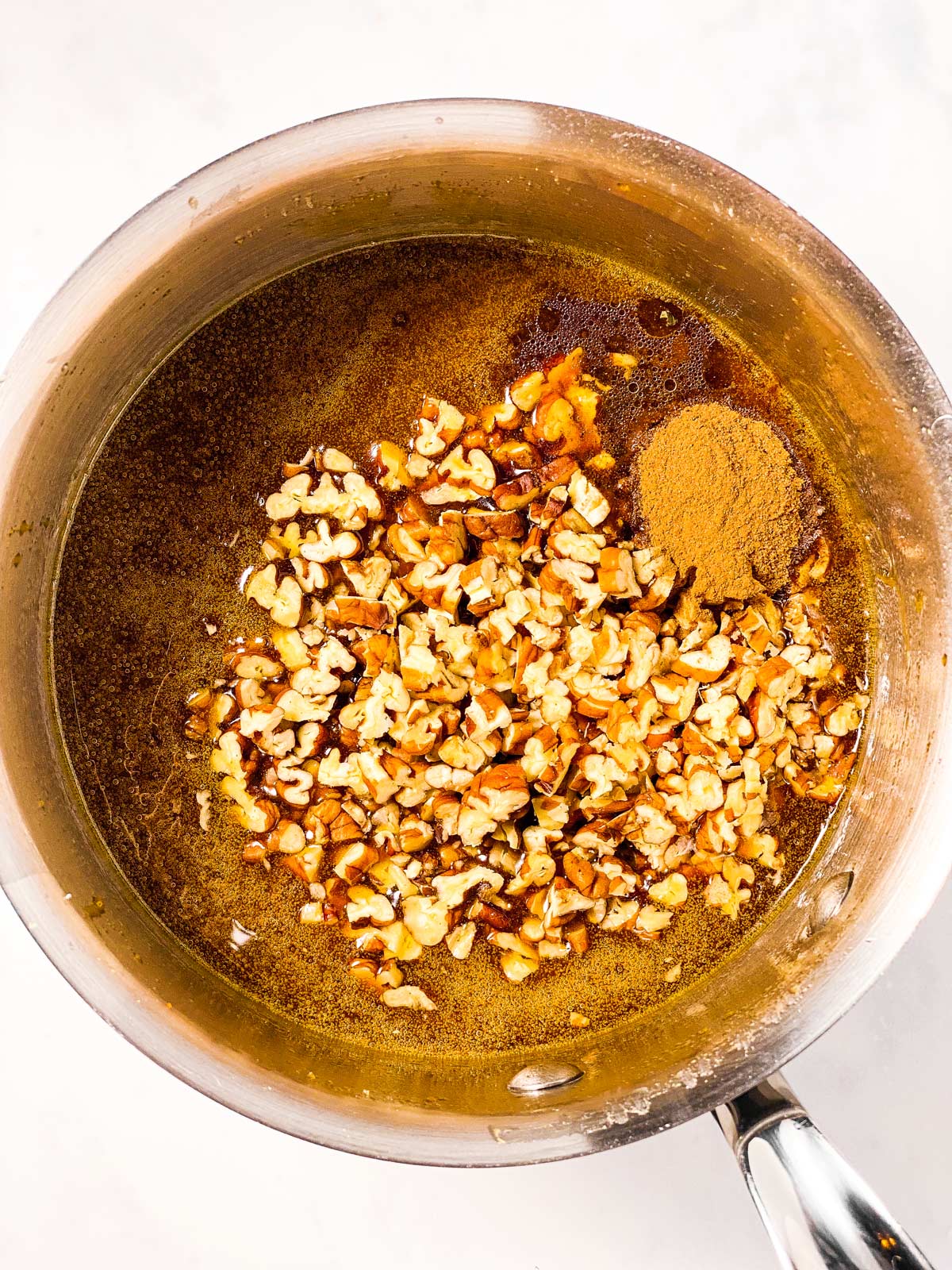 caramel sauce with pecans and cinnamon