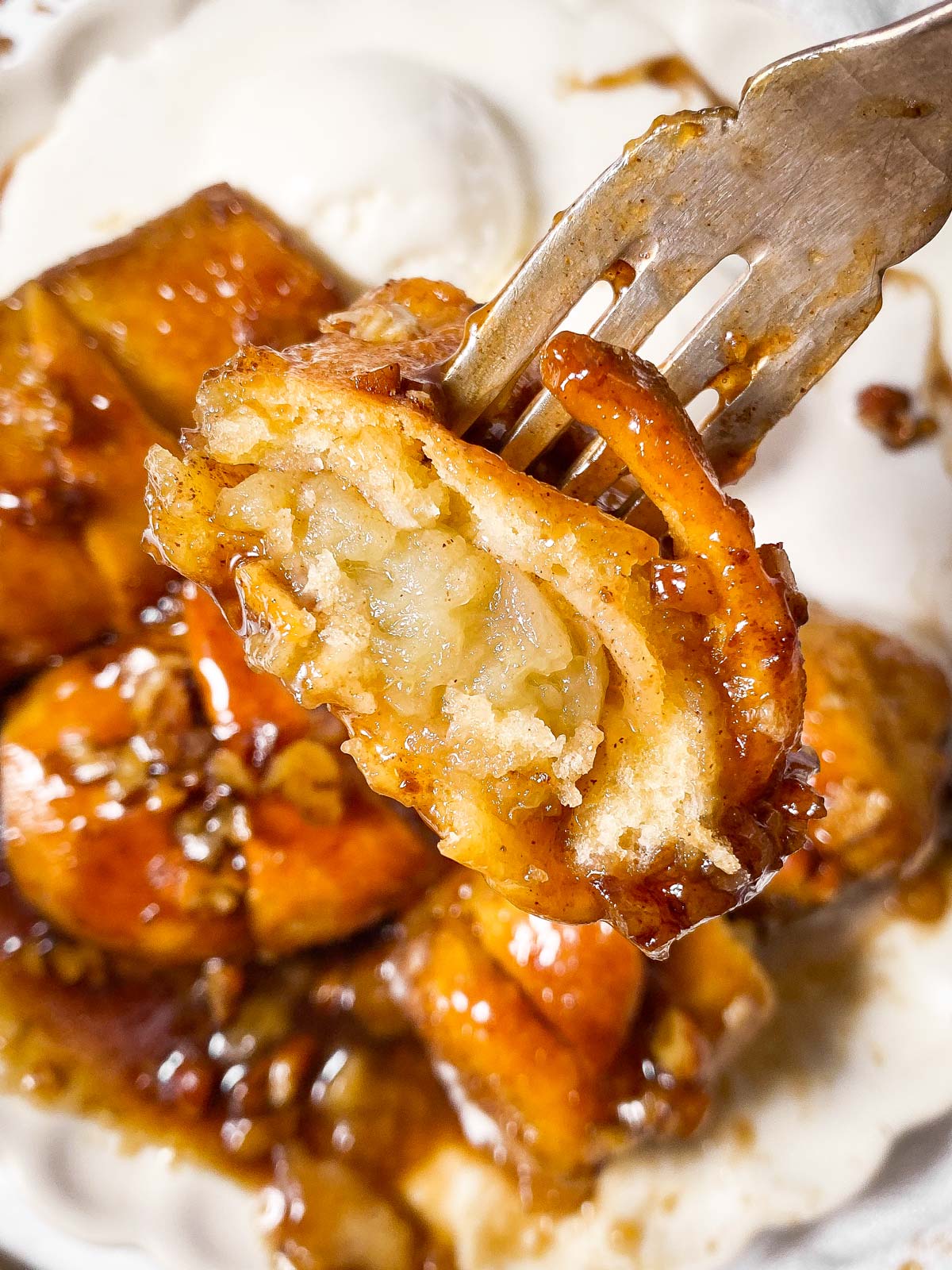 halved apple dumpling speared on fork