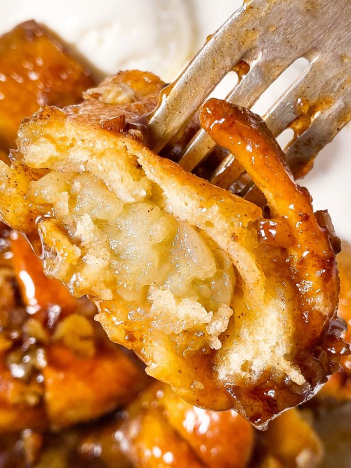 halved apple dumpling speared on fork