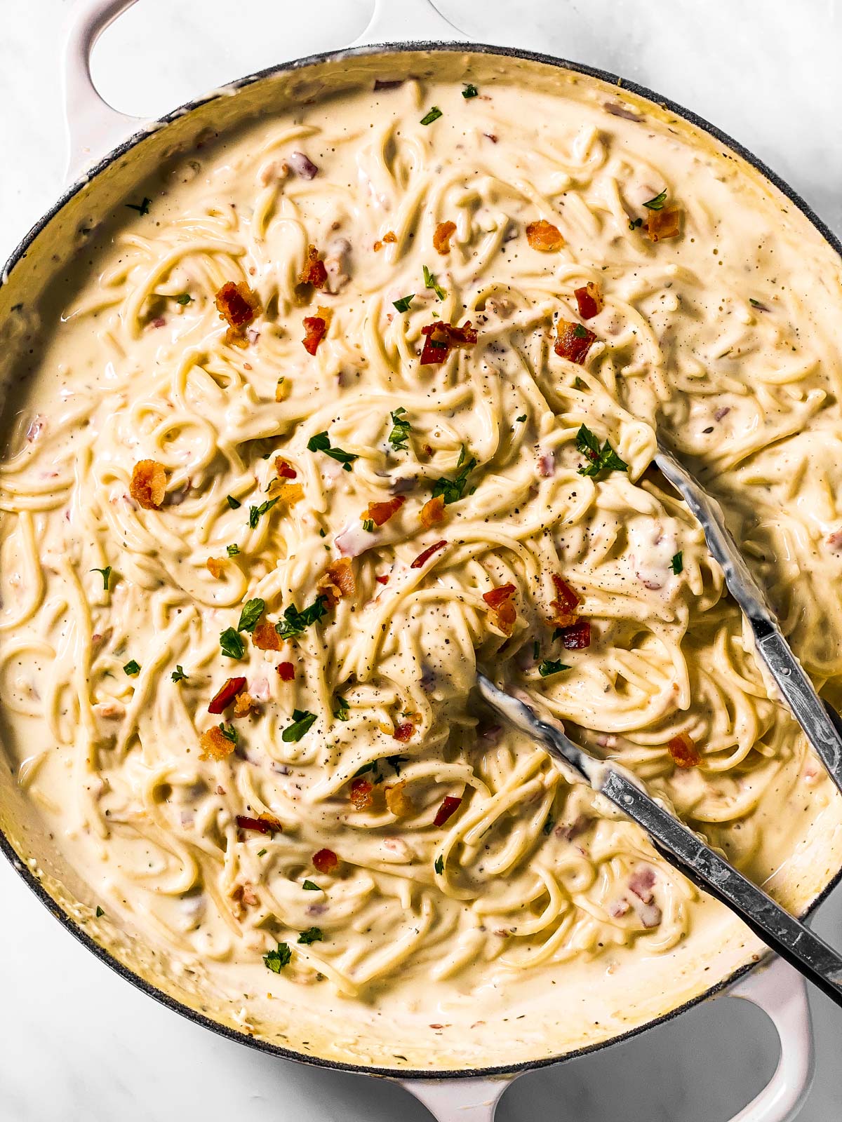 cream cheese pasta in white skillet